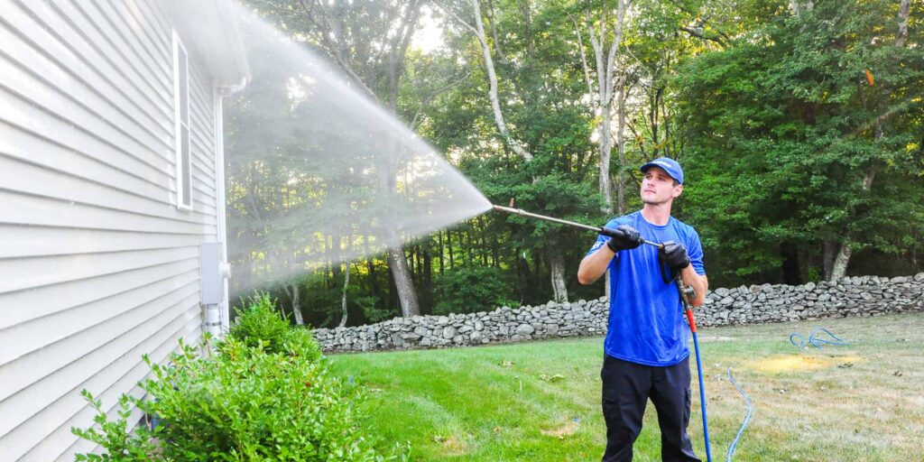 soft power washing on a homes siding.