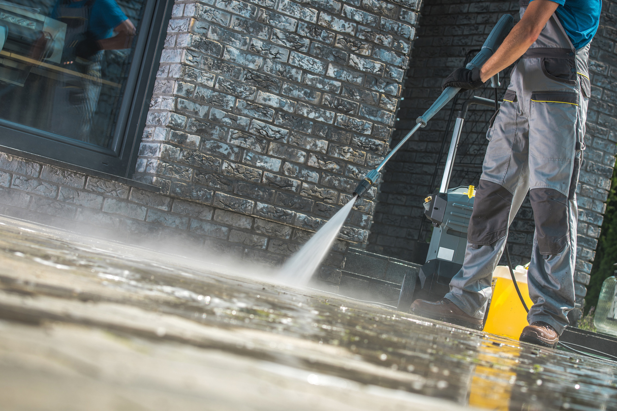 Brightness window cleaning team power washing a home in saddle river