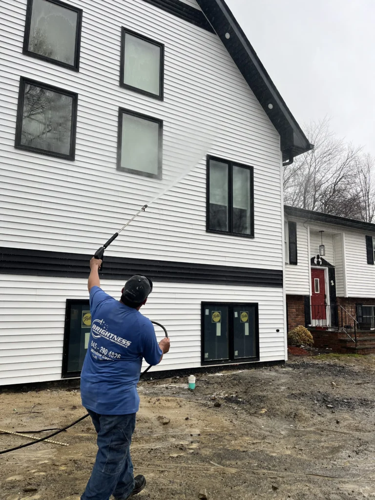 Brightness window cleaning power washing a home in new city