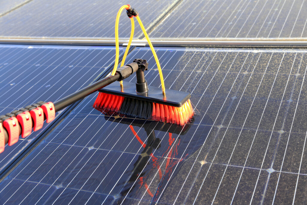 Brightness window cleaning team cleaning a ccustomers solar panels in new york
