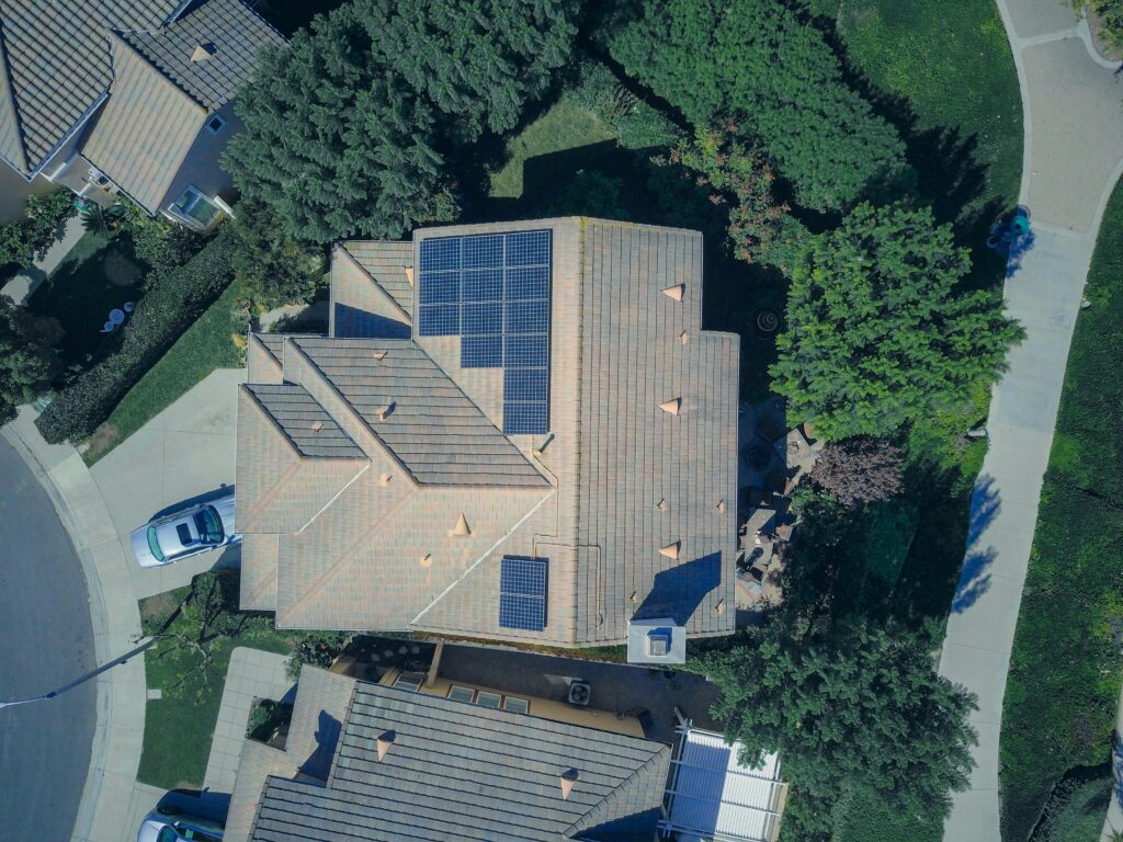 home with solar panels ready for the summer season thanks to brightness window cleaning professionals.