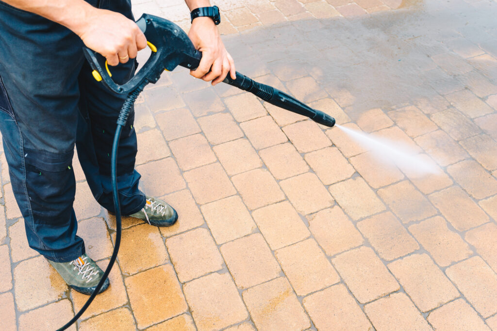 brightness window cleaning servicing a power washing client in ny